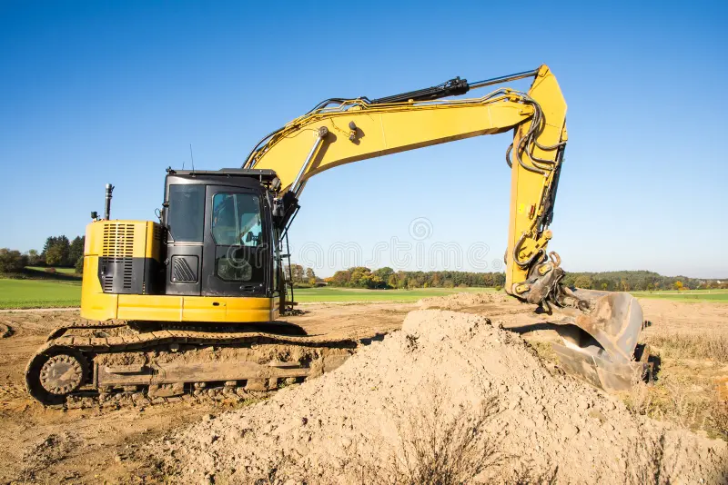 yellow earth mover construction site landscape 104656611